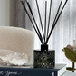 Smokey green diffuser with black reeds