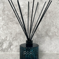 Midnight blue diffuser with black reeds