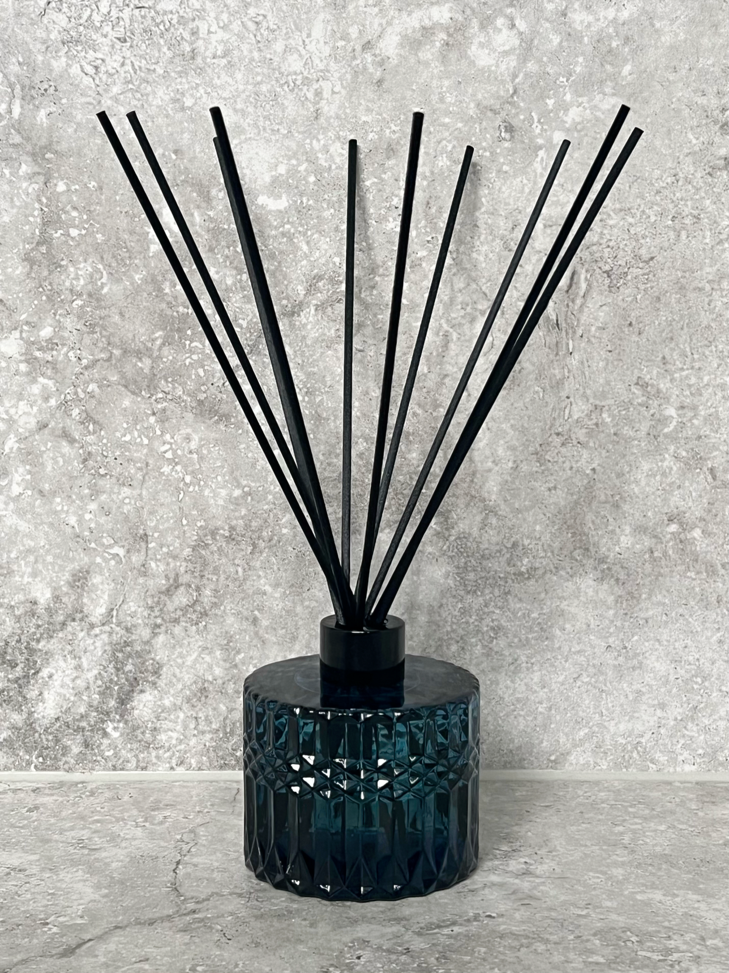 Midnight blue diffuser with black reeds